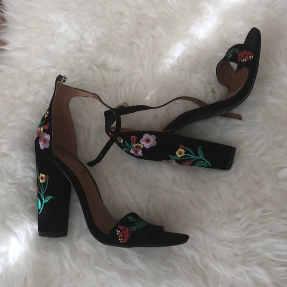 black heels with embroidered flowers